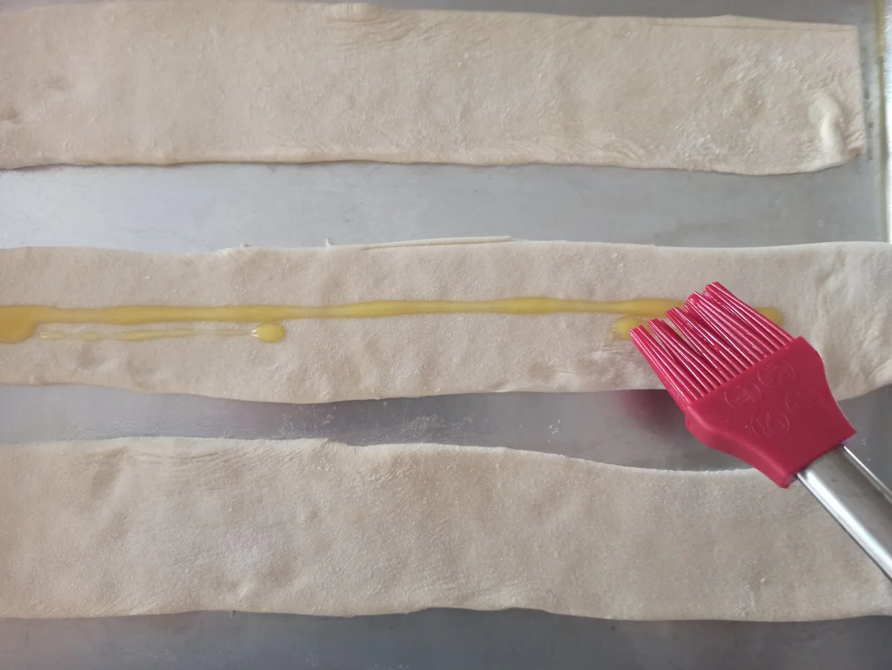 Spennellare con olio